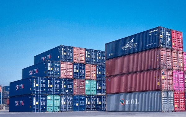 architectural photography of cargo containers stack
